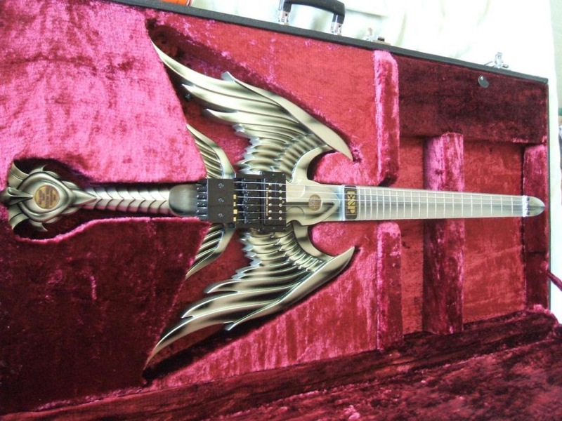 Illustration for article titled Angel Sword Guitar Plays Iron Maiden Songs, Slays Teen Pop Stars